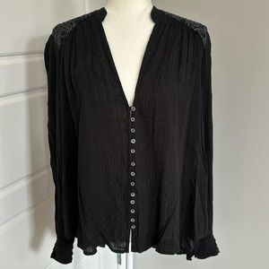 Women’s size Medium Free People blouse.